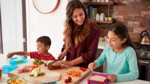 Family making school lunches