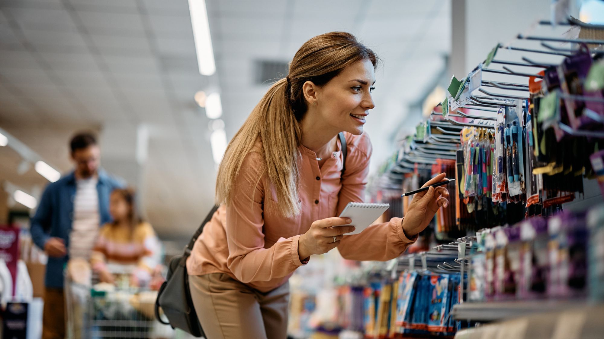 Woman buying school supplies
