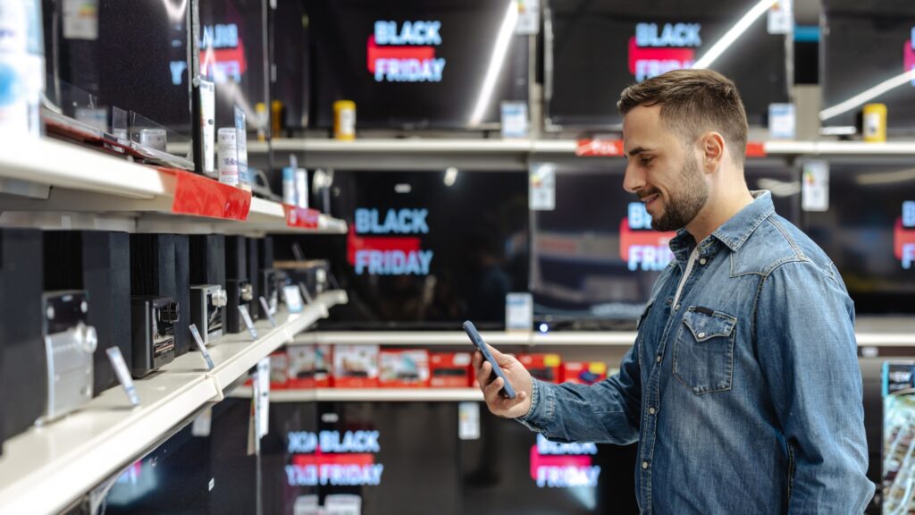 black friday, man shopping for black friday deals, black friday sales