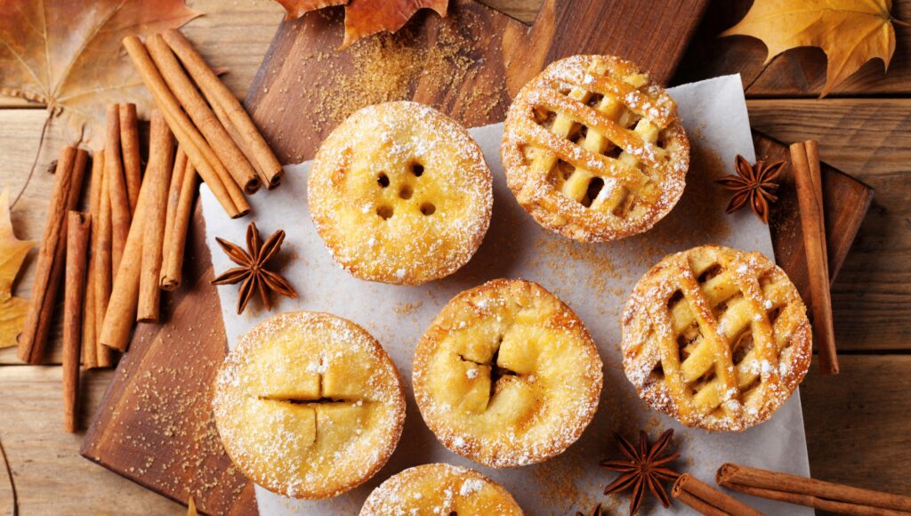 Mini apple pies and cinnamon sticks