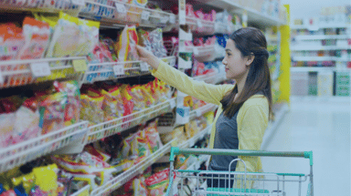 Shopper at candy aisle